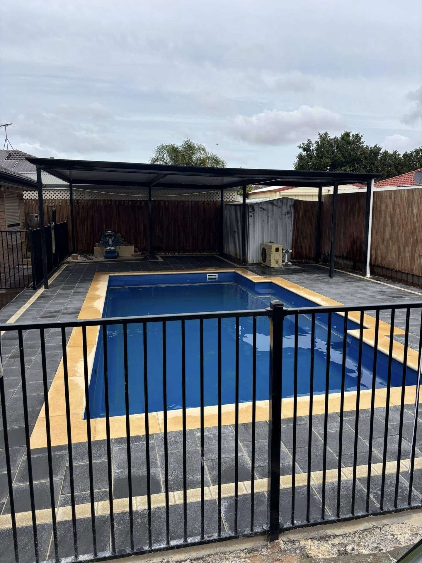 Fibreglass pool wrapped in new marble-look paving — May Paving